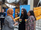 3 women having a discussion